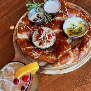 Shareable Pretzel with Dipping Sauces Locals Hour at 206 Alder